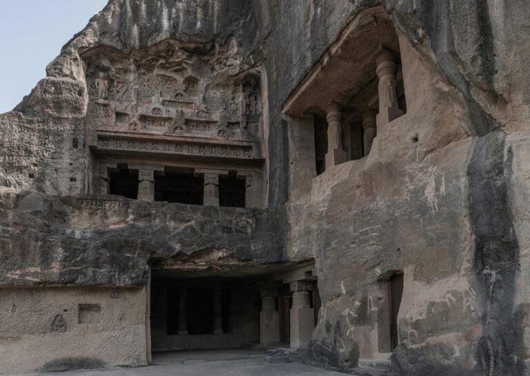 Discover the intricate rock-cut architecture of the ancient Ellora Caves in Maharashtra, India.
