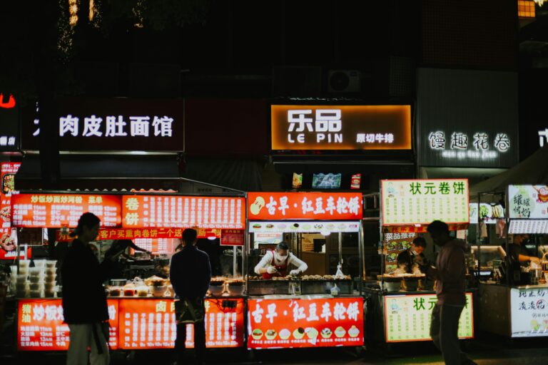 Vibrant street food market scene in Nanjing, showcasing local cuisine and urban nightlife.