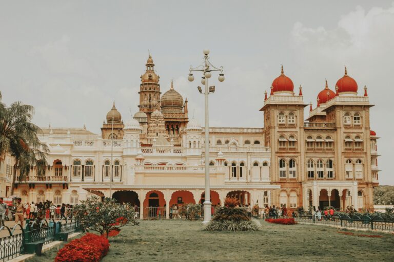 Mysore Palace's iconic architecture attracts tourists in Karnataka, India.