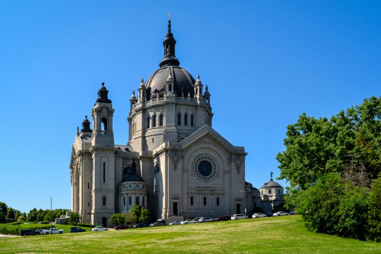 Beautiful exterior shot of the Cathedral of Saint Paul in Minnesota under a clear blue sky.